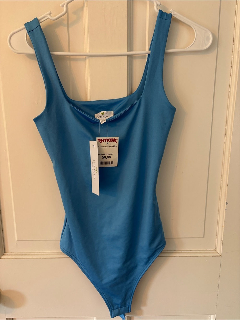 Blue Scoop Neck One-Piece Bodysuit . Brand new with tags!
